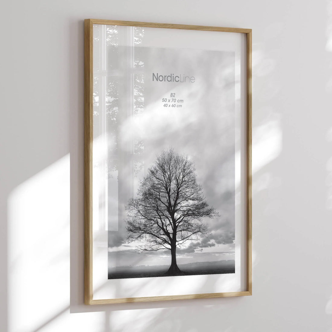 Frame crafted from solid oak, available in multiple sizes