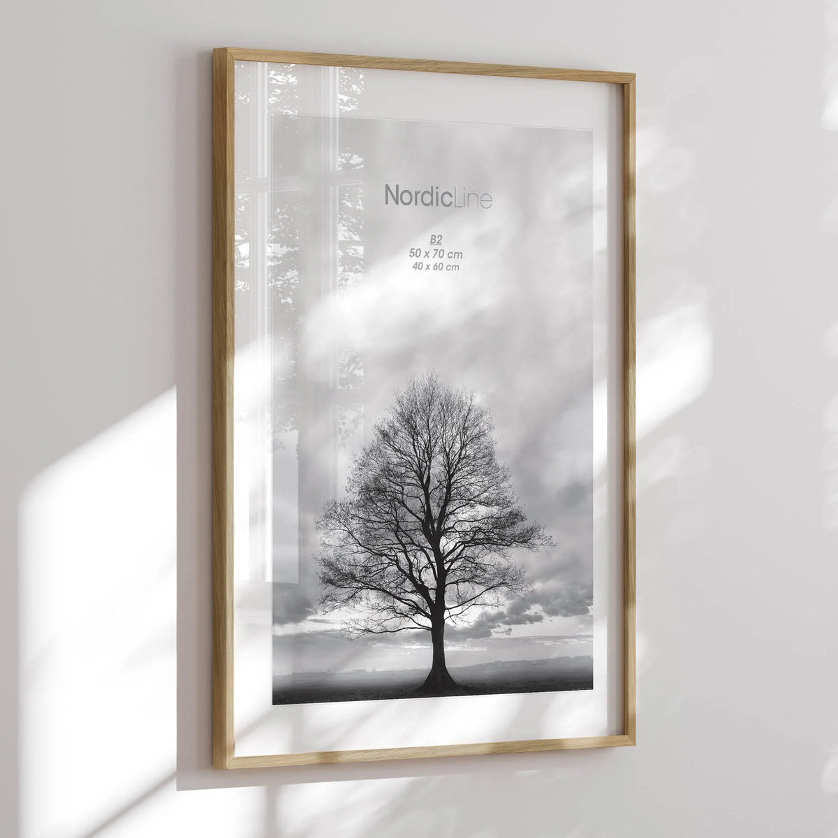 Frame crafted from solid oak, available in multiple sizes