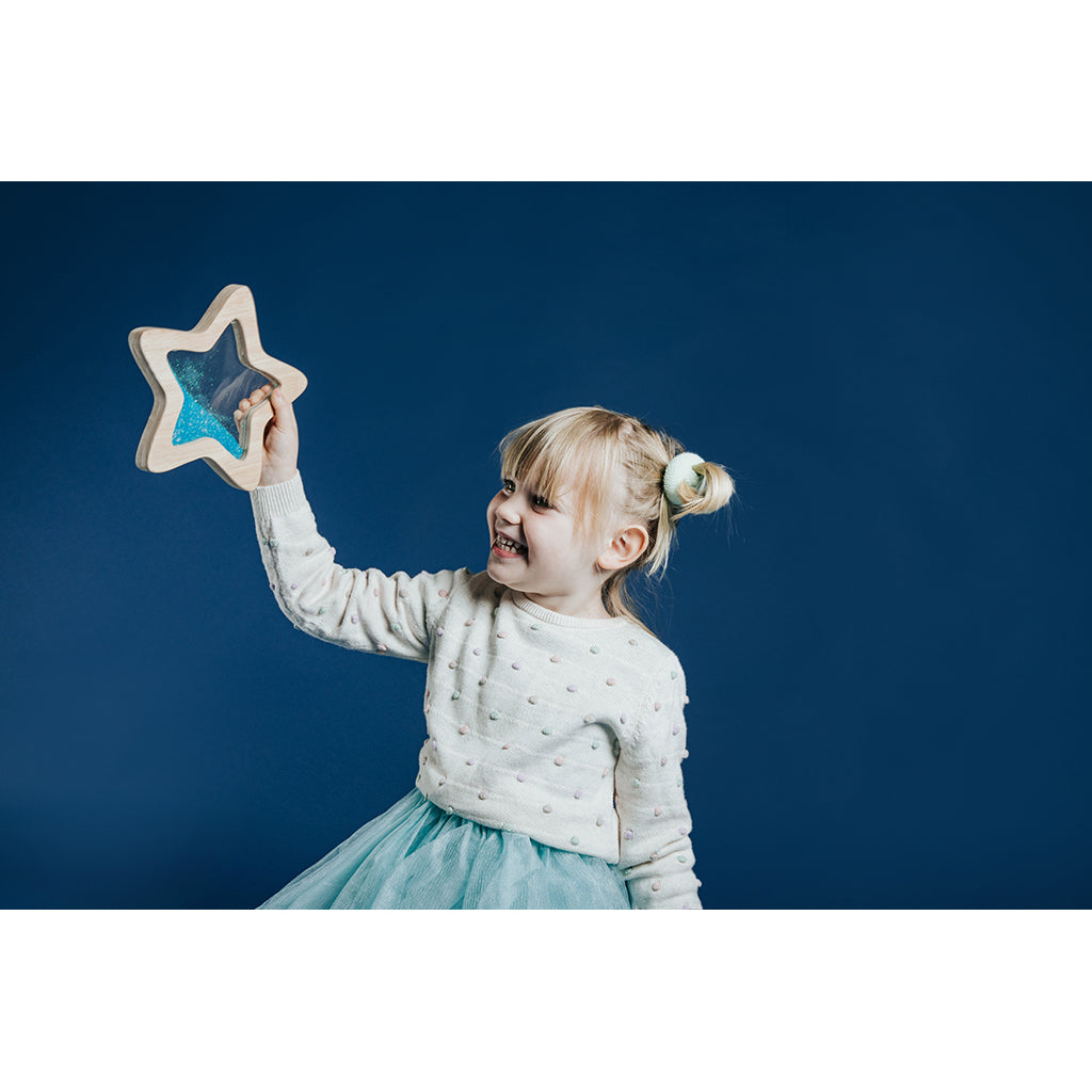 Petit Boum sensory toy, wooden star with liquid and glitter – Blue Orionis
