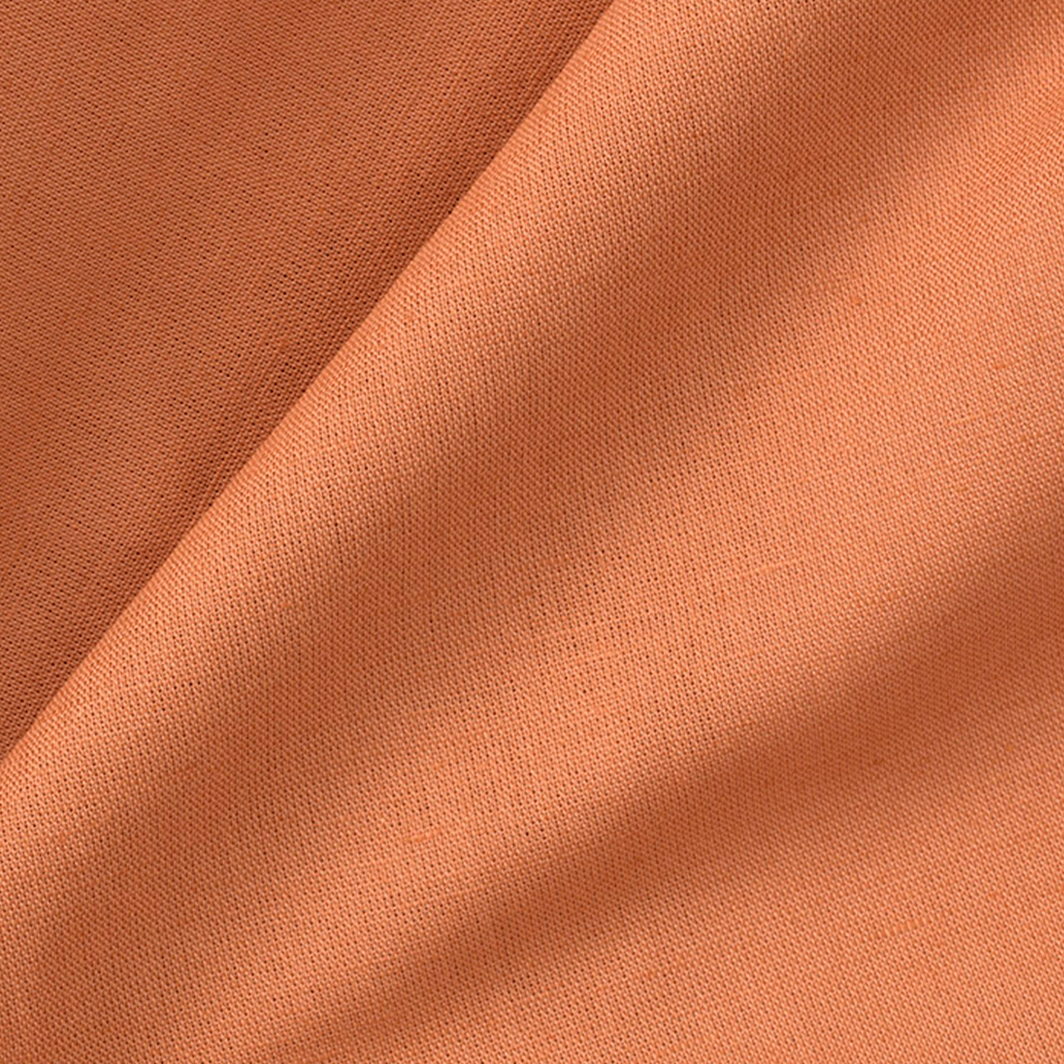 Karamel stof i et foldet design